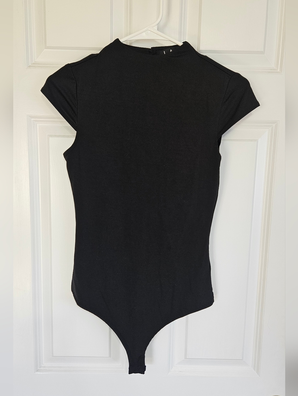 Lulu's Black Short-Sleeve Mock Neck One-Piece Bodysuit